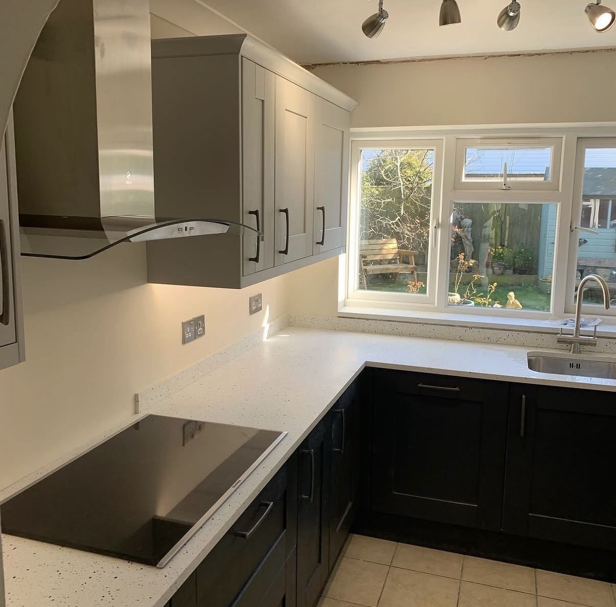 Kitchen cabinet refinishing in grey and dark navy — Hamilton Decorating East Sussex