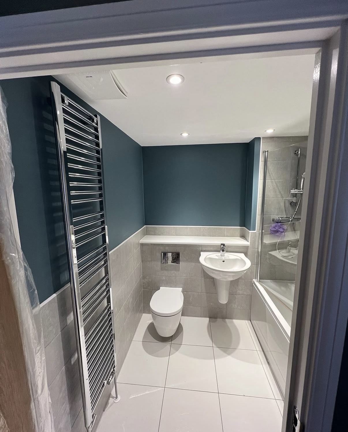 Teal bathroom painted by Hamilton Decorating Hastings East Sussex — bathroom interior painting